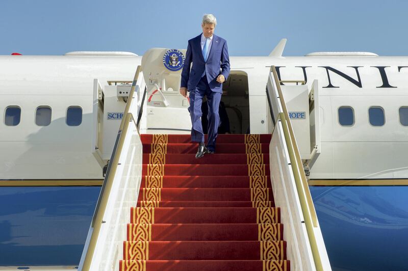 epa05038720 A handout picture made available by the US Department of State shows US Secretary of State John Kerry disembarking the plane in Abu Dhabi, United Arab Emirates, 23 November 2015. Kerry arrived in the UAE for talks with officials that are expected to focus on the Syrian war and international efforts to end the almost five-year conflict.  EPA/US DEPARTMENT OF STATE / HANDOUT  HANDOUT EDITORIAL USE ONLY *** Local Caption *** 52402793