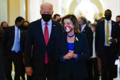 US President Joe Biden and House Speaker Nancy Pelosi. AP