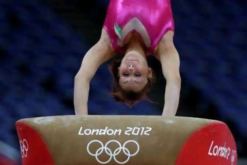 A gymnast performs on the vault during training at the 2012 Summer Olympics on Thursday. AP Photo