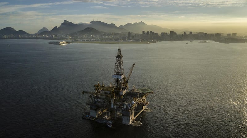 A Queiroz Galvao SA offshore oil platform is seen in an aerial photograph taken above the Guanabara Bay near Niteroi, Rio de Janeiro state, Brazil, on Thursday, April 26, 2018. The Brazilian Institute of Geography and Statistics (IBGE) is scheduled to release industrial production figures on May 3. Photographer: Dado Galdieri/Bloomberg