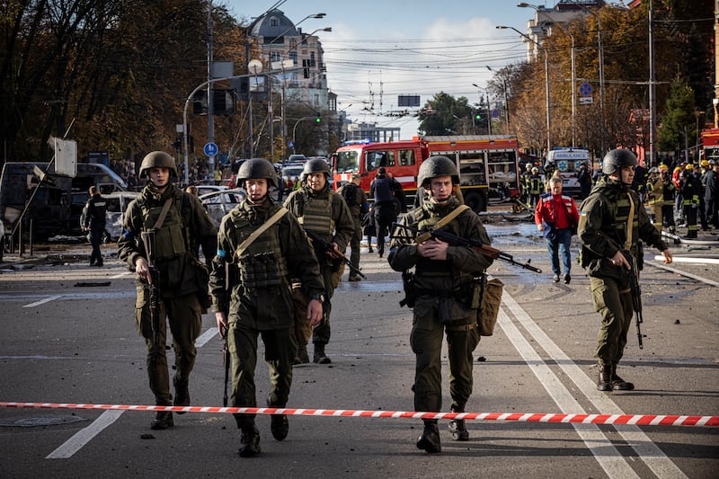 Emergency service personnel attend the site of the blast. Getty Images