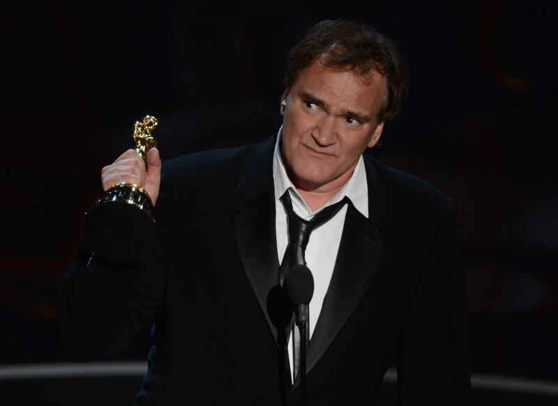 Best Original Screenplay winner Quentin Tarantino addresses the audience onstage at the 85th Annual Academy Awards on February 24, 2013 in Hollywood, California. AFP PHOTO/Robyn BECK
 *** Local Caption ***  565159-01-08.jpg