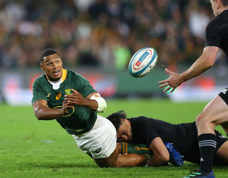 South Africa's Damian Willemse offloads. EPA 