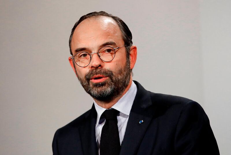 French Prime Minister Edouard Philippe delivers a speech during a press conference in Paris on January 9, 2019.  / AFP / POOL / Christophe Ena
