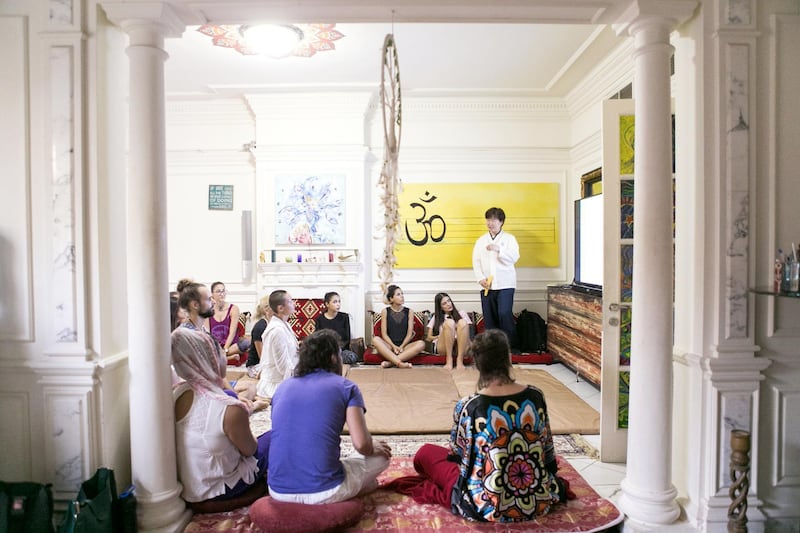 DUBAI, UNITED ARAB EMIRATES, 16 JULY 2017. 

Inside Taijitu House of Om (THO), Master Daae leads a Brain Sensitizing: Brain Energy Awareness Training session.

Wiso Barakeh, the founder of THO, shares his home space by offering free activities such as meditations, yoga, NLP, life coaching, sound healing, body movement  through the sound of traditional instruments, knowledge sharing through book clubs and soul cinema etc.

The house is a shared space for alternative healers, thinkers, mind body and soul specialists, as well as people interested in cultural evolution and self-development. 

(Photo by Reem Mohammed / The National)

Reporter: Haneen Dajani 
Section: NA

