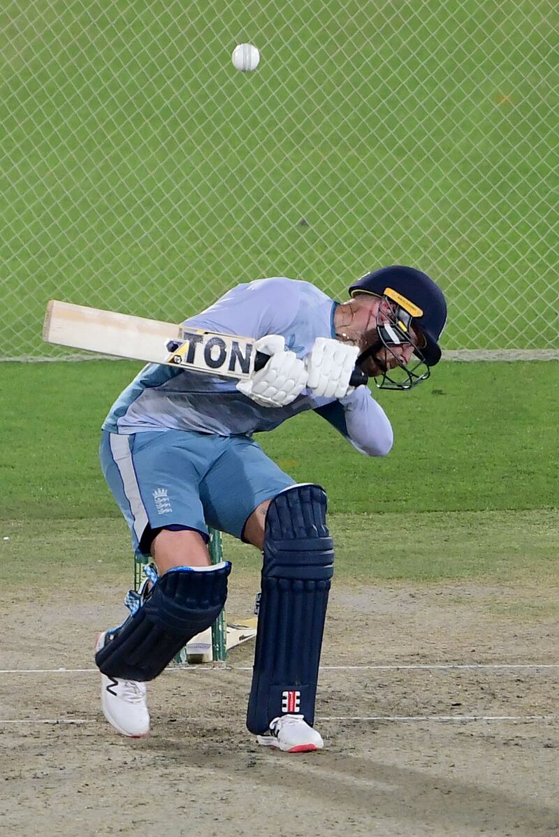 Phil Salt ducks out of the way in the nets. AFP