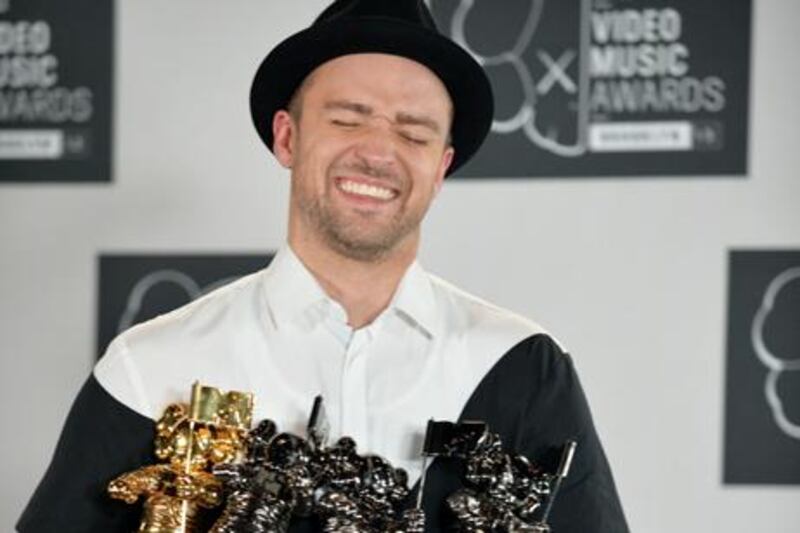 Justin Timberlake with his four awards at the MTV Video Music Awards. AFP