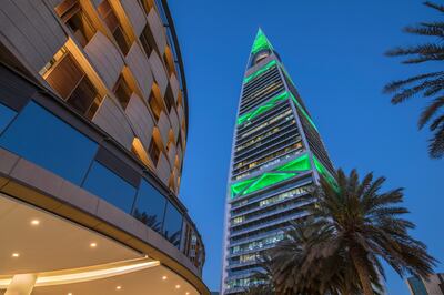 The Al Faisaliah Tower, home to the Mandarin Oriental Al Faisaliah, lit up in the green of Saudi Arabia. Photo: Mandarin Oriental Al Faisaliah