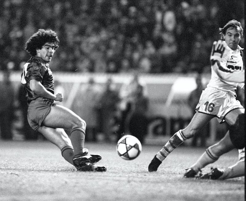 Picture showing Argentinian soccer player Diego Maradona wearing the color of FC Barcelone, during a friendship match against Paris Saint Germain,13 November 1982, in Paris. (Photo by JOEL ROBINE / AFP)