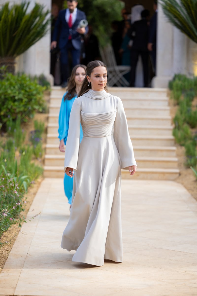 Jordan's Princess Iman wore a custom gown by Ashi Studio, founded by Saudi designer Mohammed Ashi. Reuters