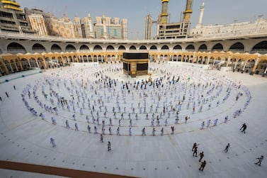 Pilgrims observe social distancing while circumambulating the Kaaba at the Grand Mosque in Makkah, Saudi Arabia. Saudi Ministry of Media via AP