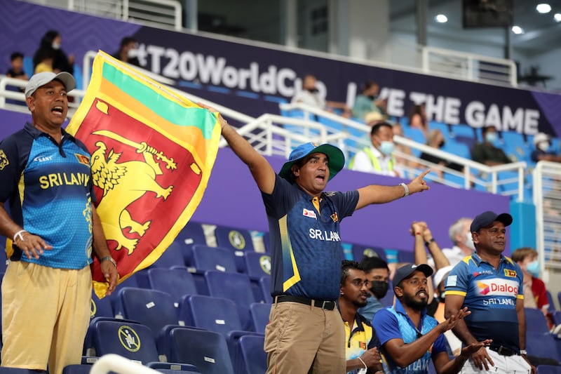 Sri Lanka fans cheer on their team at Zayed Cricket Stadium. Chris Whiteoak / The National