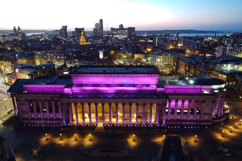 St George's Hall is illuminated in purple to commemorate International Holocaust Remembrance Day, in Liverpool, Britain. EPA 
