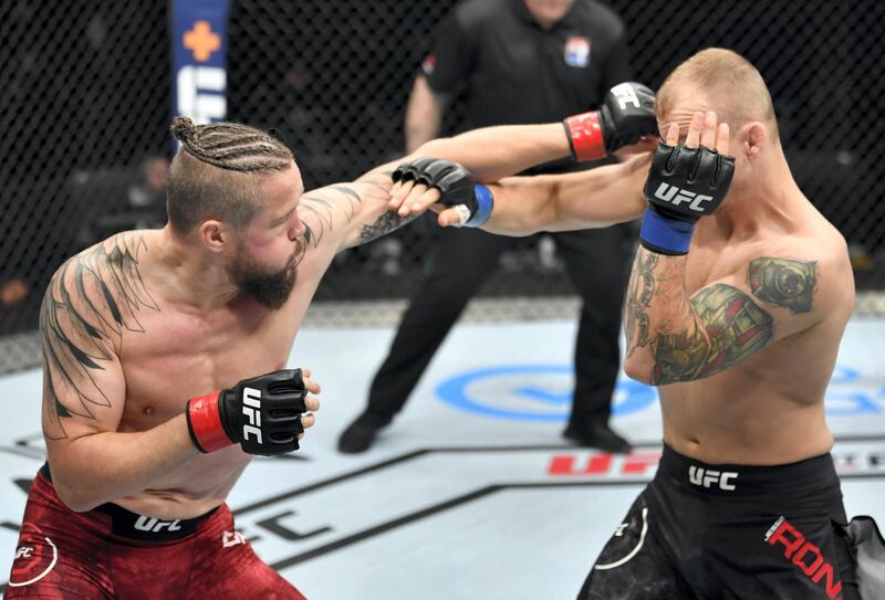 ABU DHABI, UNITED ARAB EMIRATES - JULY 26: (L-R) Nicolas Dalby of Denmark punches Jesse Ronson of Canada in their welterweight fight during the UFC Fight Night event inside Flash Forum on UFC Fight Island on July 26, 2020 in Yas Island, Abu Dhabi, United Arab Emirates. (Photo by Jeff Bottari/Zuffa LLC via Getty Images) *** Local Caption *** ABU DHABI, UNITED ARAB EMIRATES - JULY 26: (L-R) Nicolas Dalby of Denmark punches Jesse Ronson of Canada in their welterweight fight during the UFC Fight Night event inside Flash Forum on UFC Fight Island on July 26, 2020 in Yas Island, Abu Dhabi, United Arab Emirates. (Photo by Jeff Bottari/Zuffa LLC via Getty Images)