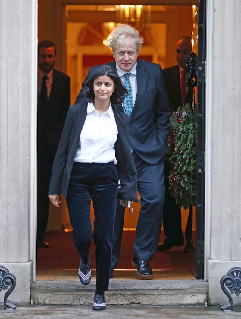 Prime Minister Boris Johnson with Munira Mirza, Director of the Number 10 Policy Unit, who has resigned after the PM failed to apologise for using a "scurrilous" Jimmy Savile slur against Sir Keir Starmer. PA.