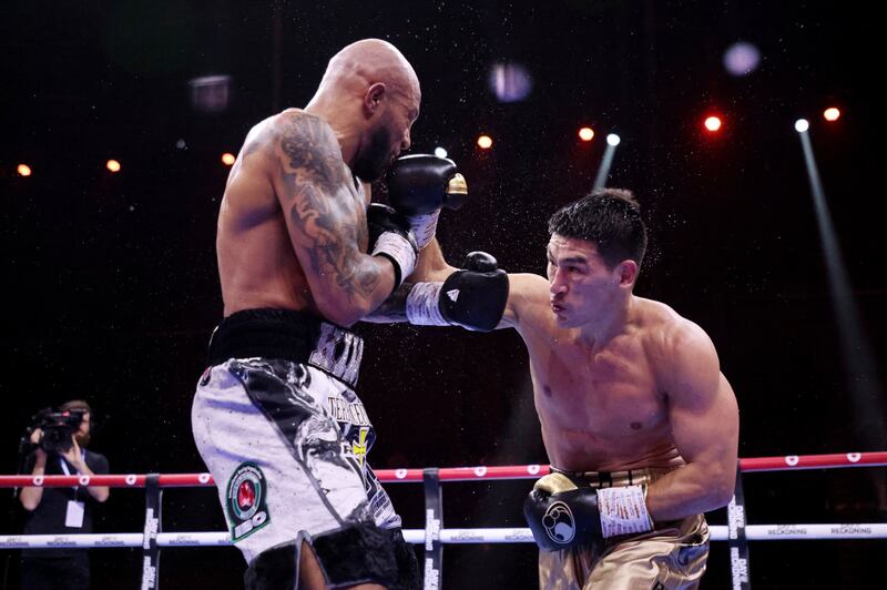 Dmitry Bivol lands a punch on his way to a unanimous points victory over against Lyndon Arthur at the Kingdom Arena in Riyadh on December 23, 2023. Reuters