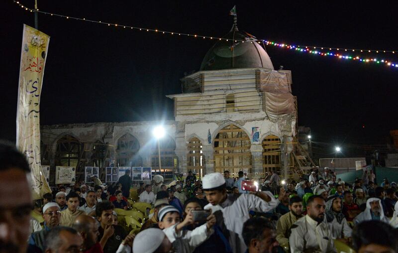 Thousands of people attend events to mark the Prophet Mohammed's birthday in Mosul, Iraq.