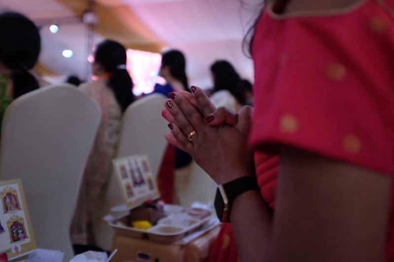 A Hindu prays at the foundation stone laying ceremony.