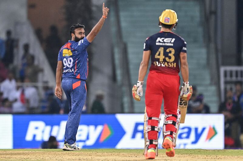 Lucknow Super Giants' Amit Mishra celebrates after taking the wicket of Royal Challengers Bangalore's Suyash Prabhudessai. AFP