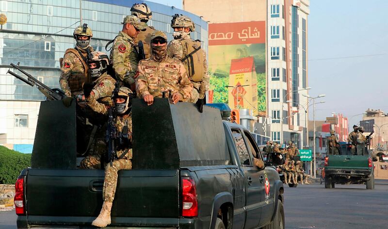 Security forces patrol in Basra, Iraqy. AP Photo
