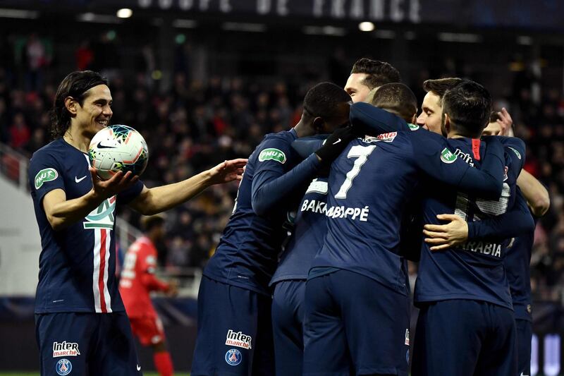 Paris players celebrate after a Dijon own-goal. AFP