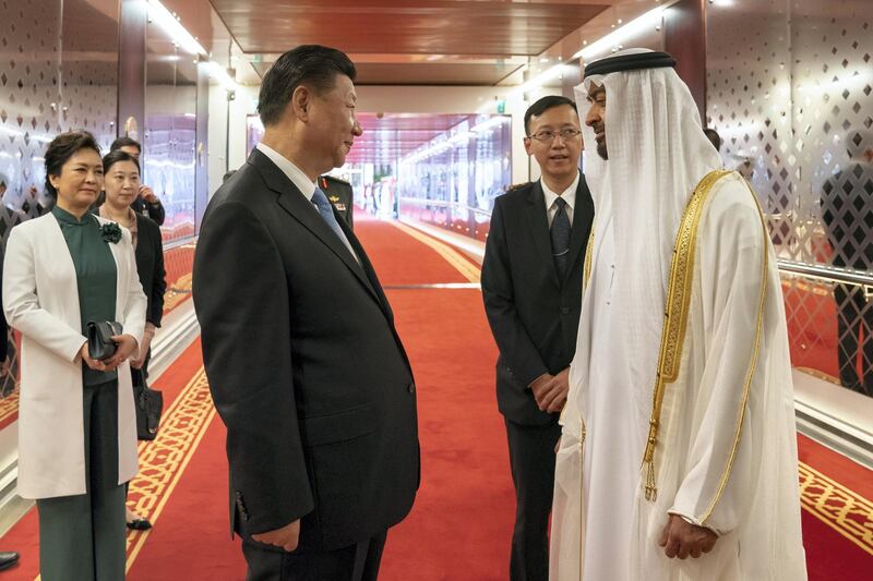 ABU DHABI, UNITED ARAB EMIRATES - July 21, 2018: HH Sheikh Mohamed bin Zayed Al Nahyan, Crown Prince of Abu Dhabi and Deputy Supreme Commander of the UAE Armed Forces (R) bids farewell to HE Xi Jinping, President of China (L), at the Presidential Airport. Seen with Peng Liyuan, First Lady of China (L).

( Mohamed Al Hammadi / Crown Prince Court - Abu Dhabi )
---