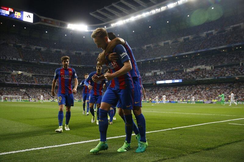 Barcelona’s Ivan Rakitic celebrates scoring in the 73rd minute to put Barcelona up 2-1. Susana Vera / Reuters