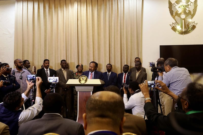 Sudan's new Prime Minister Abdalla Hamdok addresses the media following his swearing in at the presidential palace in Khartoum, Sudan. EPA