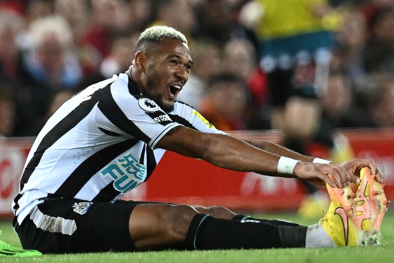 Newcastle midfielder Joelinton stretches in the second half. AFP