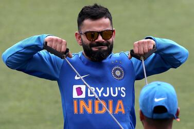 India's captain Virat Kohli stretches during a training session ahead of their first Twenty20 cricket match against Sri Lanka in Gauhati, India, Saturday, Jan. 4, 2020. (AP Photo/Anupam Nath)