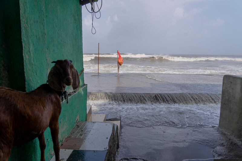 Waves hit the Arabian Sea coast in Mumbai on Tuesday. AP
