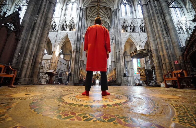 Abbey Marshal Howard Berry stands at the centre of the Cosmati pavement before the altar at Westminster Abbey. PA