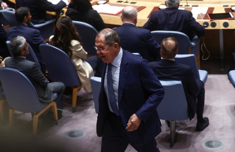 Mr Lavrov leaving the chamber. Reuters