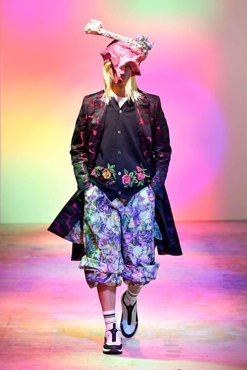 At Comme des Garcons, hard masculine tailoring was softened with pretty floral patterns. Courtesy Comme des Garcons