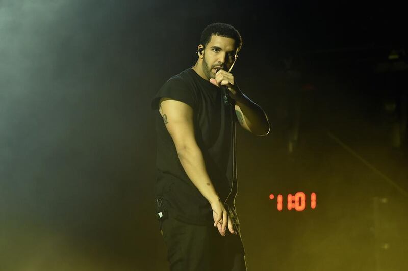 INDIO, CA - APRIL 12: Rapper Drake performs onstage during day 3 of the 2015 Coachella Valley Music & Arts Festival (Weekend 1) at the Empire Polo Club on April 12, 2015 in Indio, California.   Kevin Winter/Getty Images for Coachella/AFP