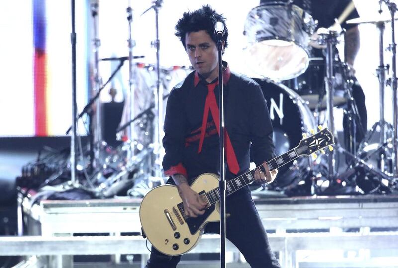 Billie Joe Armstrong, of Green Day, performs Bang Bang at the American Music Awards in Los Angeles. Matt Sayles / Invision / AP