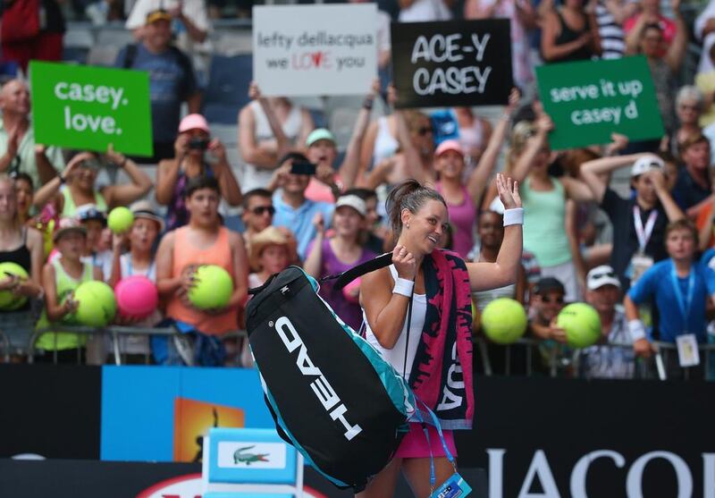 Casey Dellacqua of Australia, a local favourite, celebrates upset victory in the second round against the seeded Kirsten Flipkens of Belgium. Scott Barbour / Getty Images