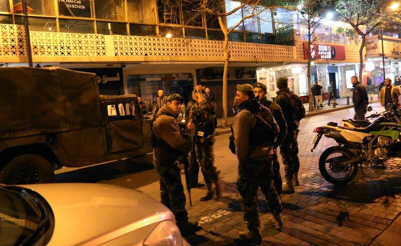 Lebanese security forces secure the street near the cafe in Hamra street in Beirut where a suicide bomber was arrested. Anwar Amro / AFP