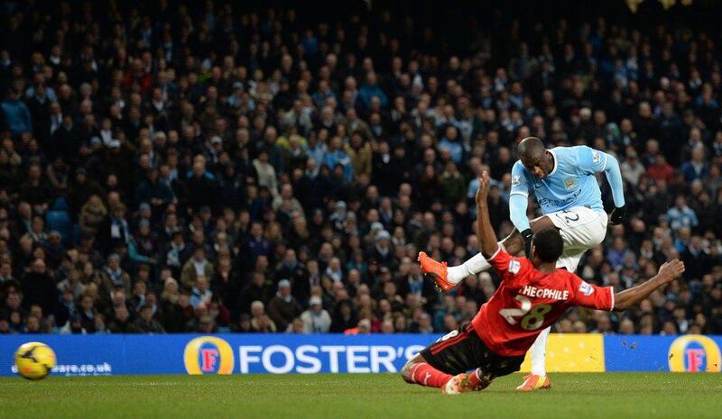 Centre midfield: Yaya Toure, Manchester City. Scored the 14th goal of his remarkable season after a solo run against Cardiff. Dominant again. Peter Powell / EPA