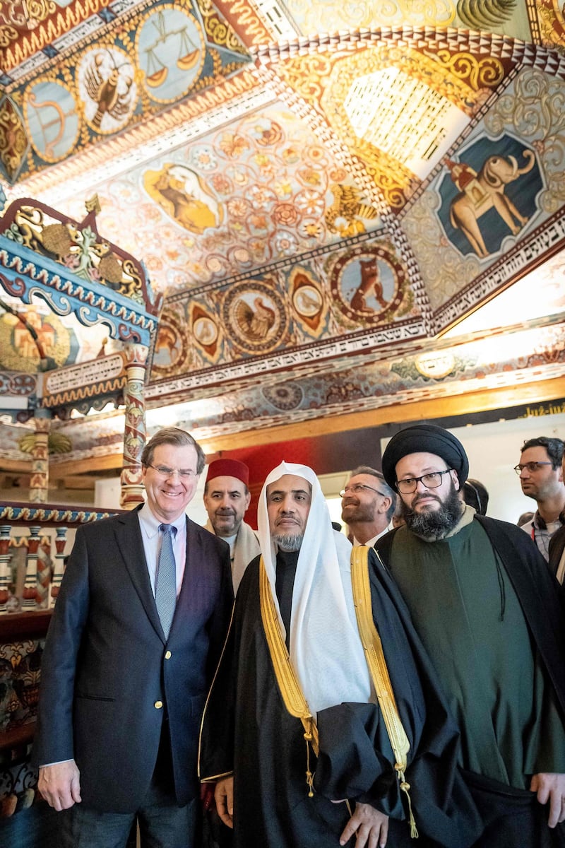 David Harris, Mohammad Abdulkarim Al Issa and a member of the Muslim delegation visit the POLIN Museum of the History of Polish Jews in Warsaw. AFP