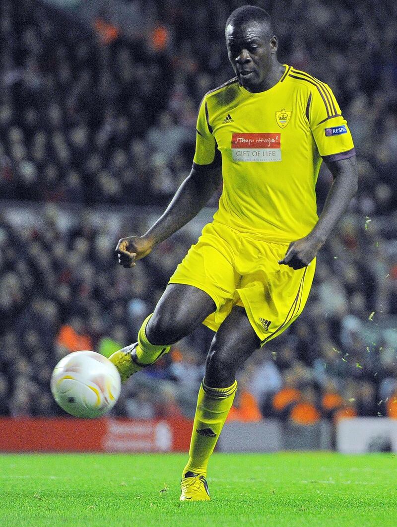 (FILES) A file picture taken in Liverpool, on October 25, 2012, shows Congolese footballer Christopher Samba playing for Anzhi Makhachkala against Liverpool. English Premiership team Queens Park Rangers signed Samba on Thursday January 31, 2013, from Russian club Anzhi Makhachkala on a four-and-a-half-year contract, with media reports claiming the transfer fee was £12.5 million ($19.7 million, 14.6 million euros). AFP PHOTO/ANDREW YATES/FILES
 *** Local Caption ***  384960-01-08.jpg