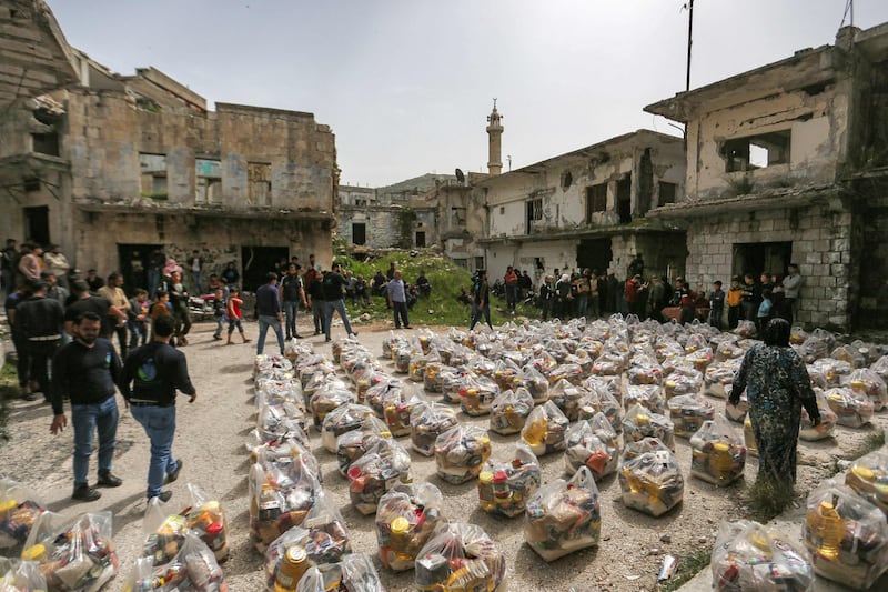 Food packets arranged for distribution in Al Najieh, in Syria's rebel-held Idlib province. AFP