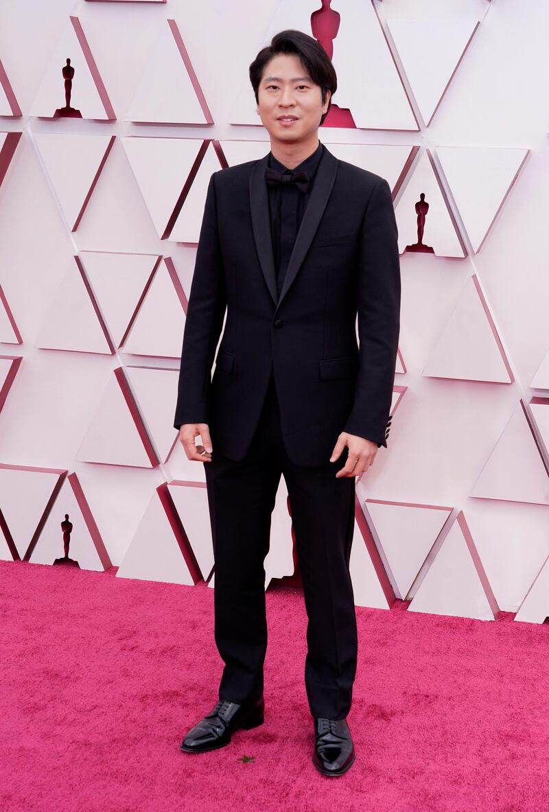Erick Oh arrives at the 93rd Academy Awards at Union Station in Los Angeles, California, on April 25, 2021. AP