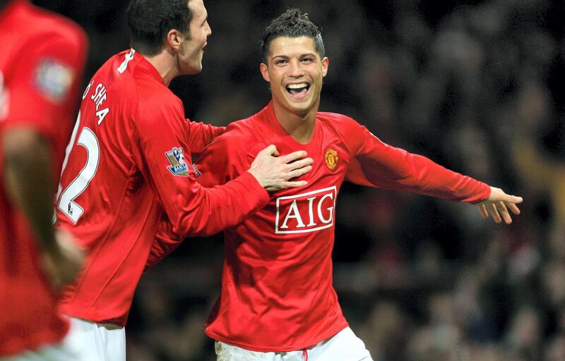 Cristiano Ronaldo (R) of Manchester United celebrates after scoring during the Premier league football match against Newcastle United at Old Trafford, Manchester , north-west England, 12 January 2008. AFP PHOTO/ANDREW YATES  Mobile and website use of domestic English football pictures are subject to obtaining a Photographic End User Licence from Football DataCo Ltd Tel : +44 (0) 207 864 9121 or e-mail accreditations@football-dataco.com - applies to Premier and Football League matches. / AFP PHOTO / ANDREW YATES