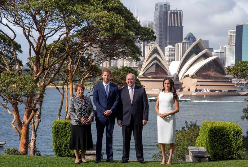 With the Sydney Opera House in the background, Prince Harry and his wife Meghan meet Australian Governor-General Peter Cosgrove. AFP