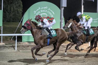 Somoud, ridden by Connor Beasley, races to victory in the Al Ain Mile. Antonie Robertson/The National