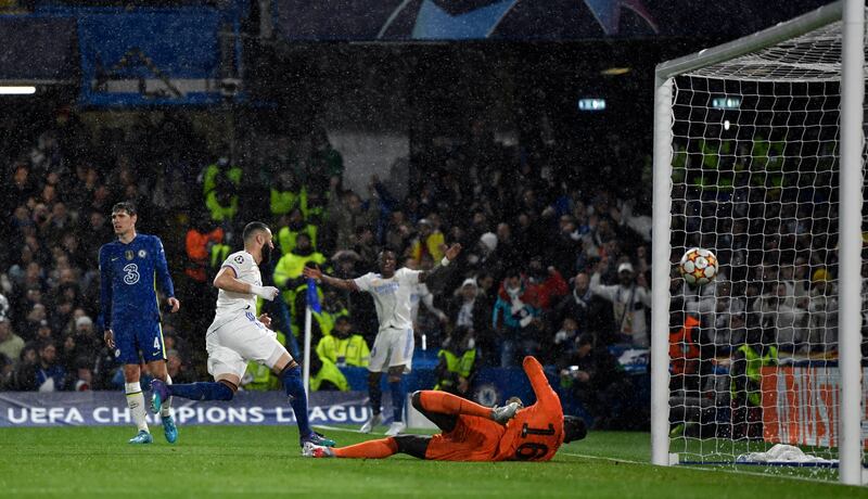 Real attacker Karim Benzema scores their first goal. Reuters