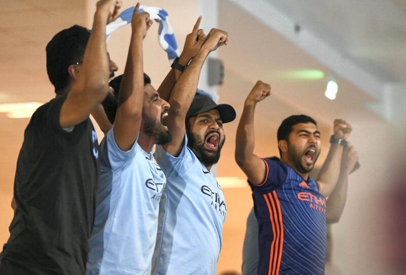 Abu Dhabi, United Arab Emirates - Manchester City fans rejoice as the team wins the Premier League against Brighton Albion 4-1, special screening at Mubadala Arena, Zayed Sports City. Khushnum Bhandari for The National