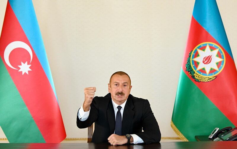 Azerbaijani President Ilham Aliyev gestures as he addresses the nation in Baku, Azerbaijan. AP