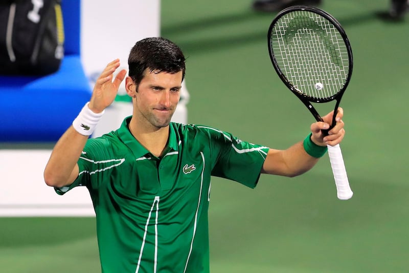 Novak Djokovic celebrates after beating Malek Jaziri in the Dubai Duty Free Tennis Championships first round on Monday. Reuters